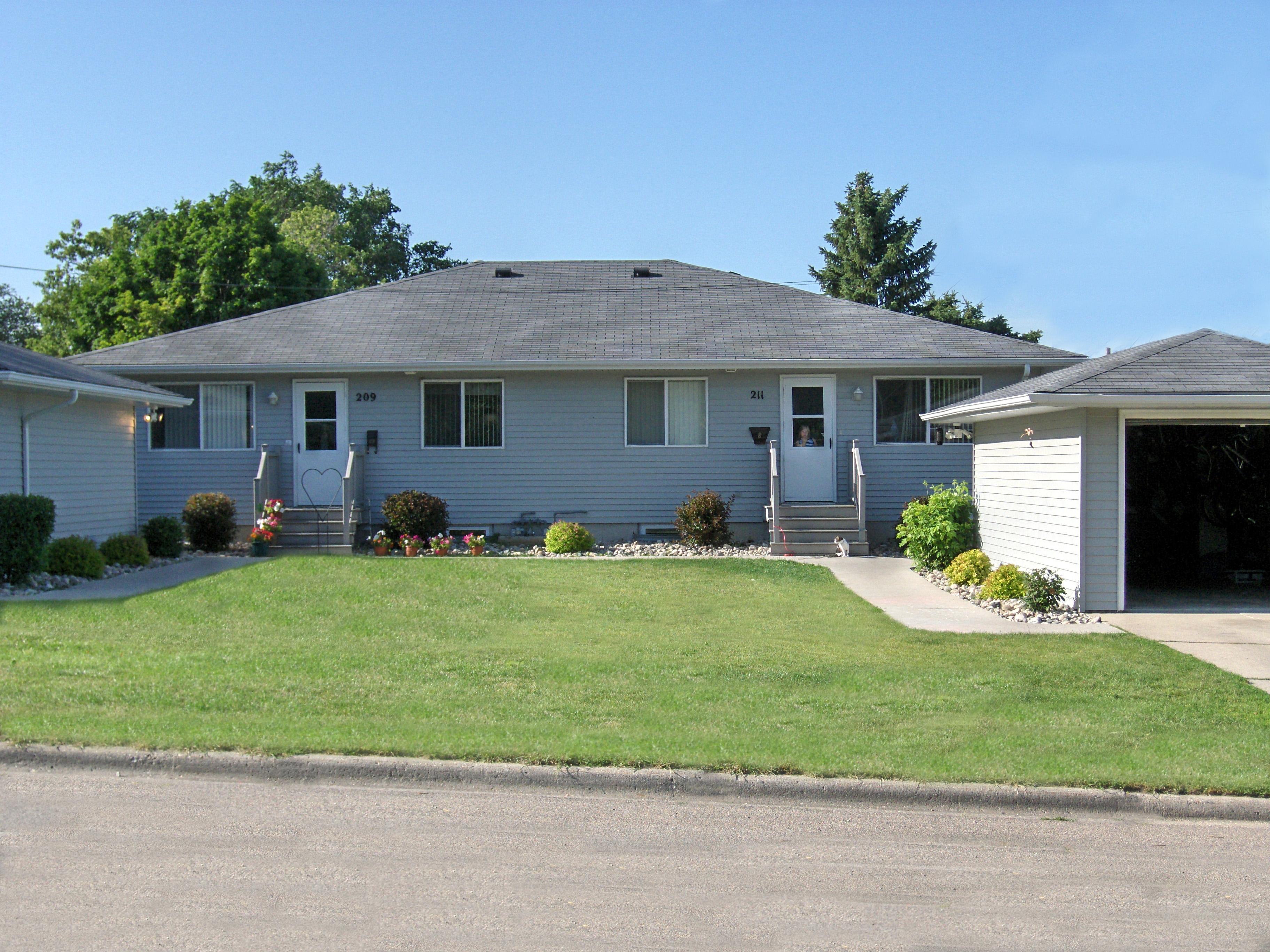 Fir duplex exterior view from the street